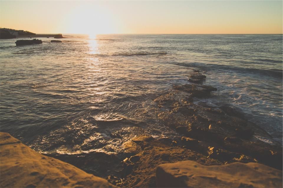 The beach and the water beyond it